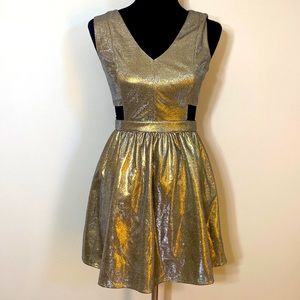 Metallic Gold fit and flare cut out mini party dress